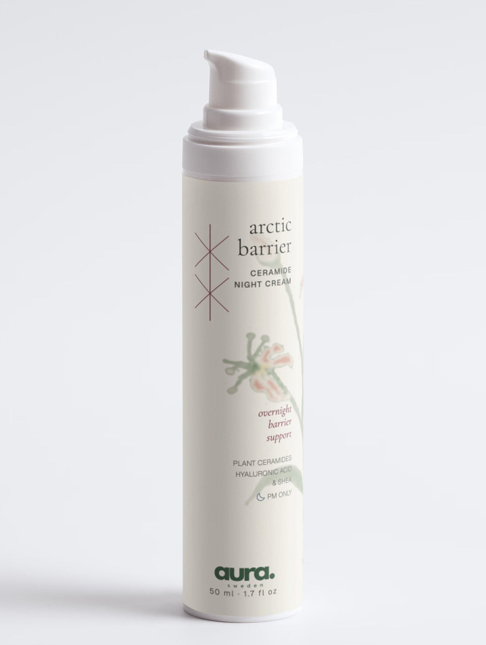 A white pump bottle of aura sweden Arctic Barrier night cream